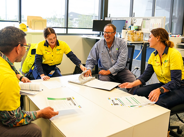 Group sitting around business desk