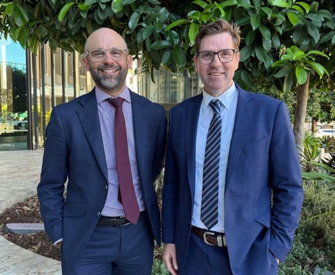 Mayor Cr Geoff McDonald (right) with Queensland Treasurer David Janetzki in Brisbane.